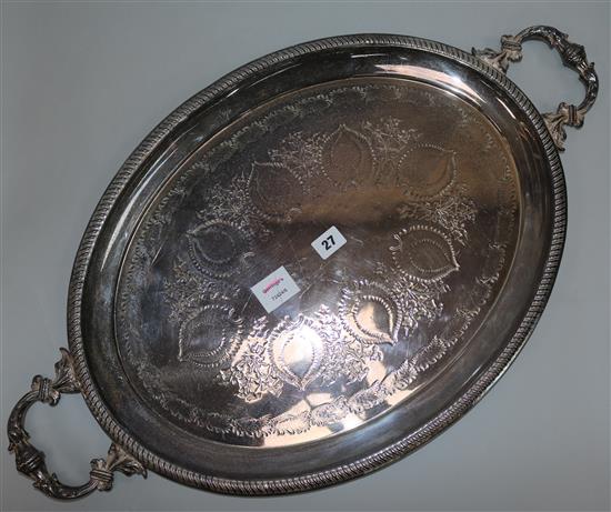 An oval plated tea tray, 28.5in over handles.
